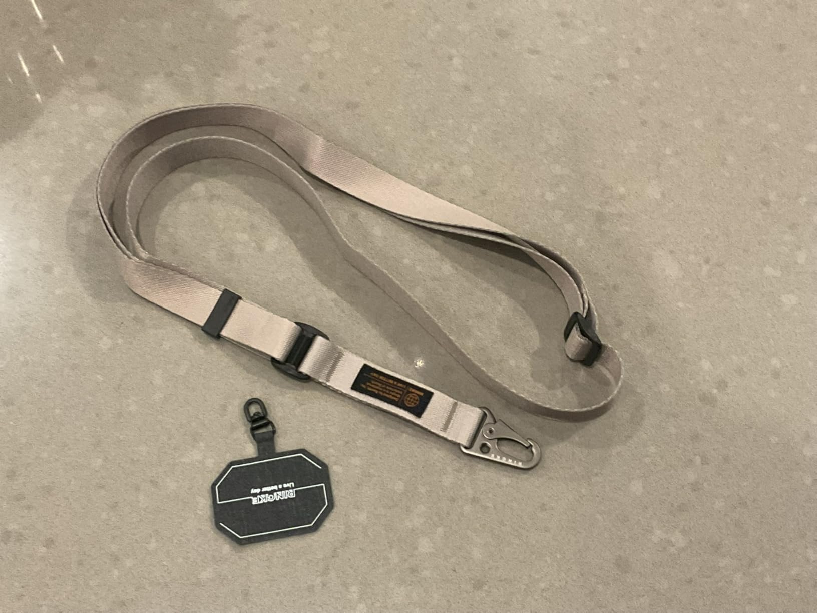 Ringke Strap Holder Link Laccetto Warm Gray Antistrappo